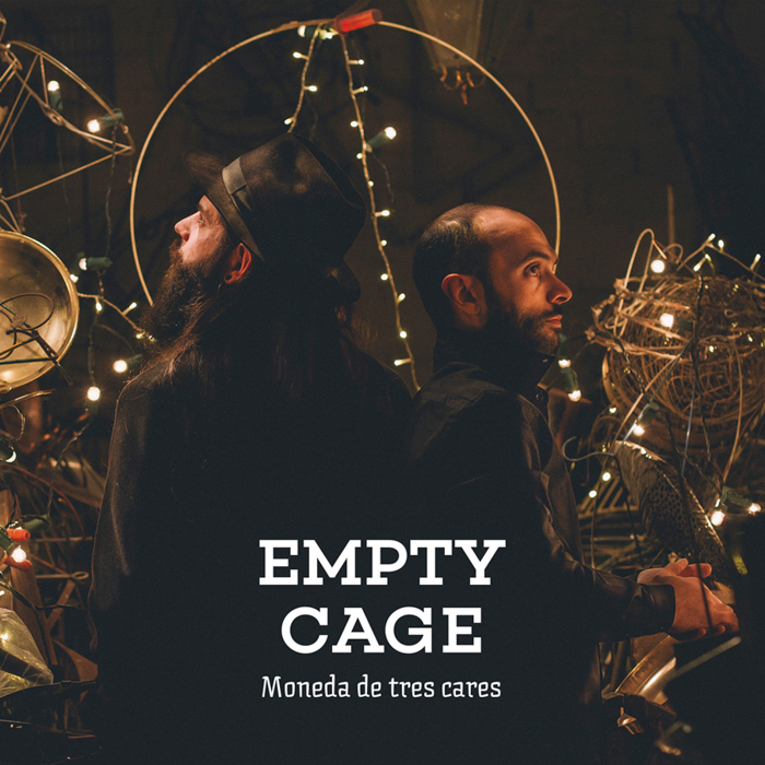 Empty Cage - Moneda de tres cares Empty Cage - Moneda de tres cares